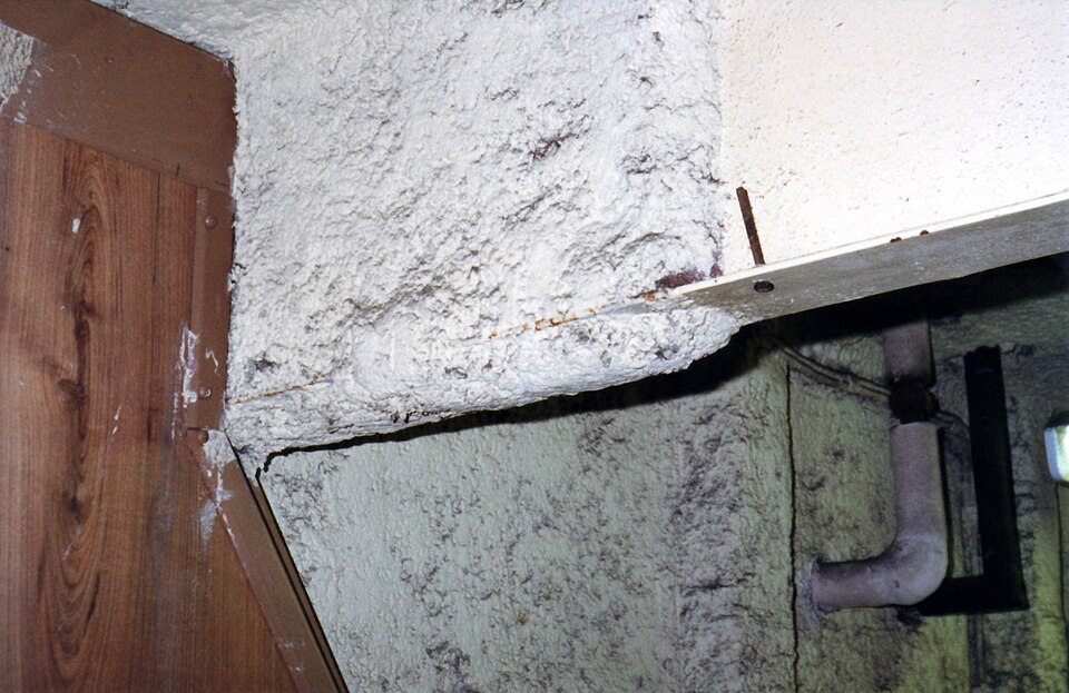 Sprayed passive fire protection on steel — representative photo